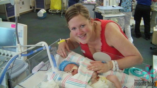 A mother and baby in a NICU. Logo: Houston moms Blog. 