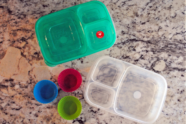 Three muffin cups and Two plastic containers each with three divisions.