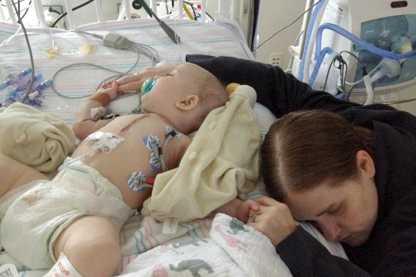 Mom and baby at the hospital sleeping, baby was born with a congenital heart defect