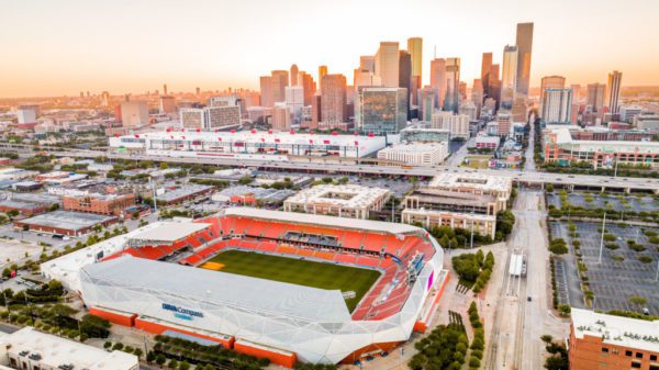 A stadium and the Houston skyline.