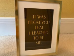 Framed text states: It was from you that I learned to be me. 