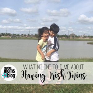 Two smiling children with their arms around each other standing in front of a pond. Text states: What no one told me about having Irish twins. Logo: Houston moms blog. 
