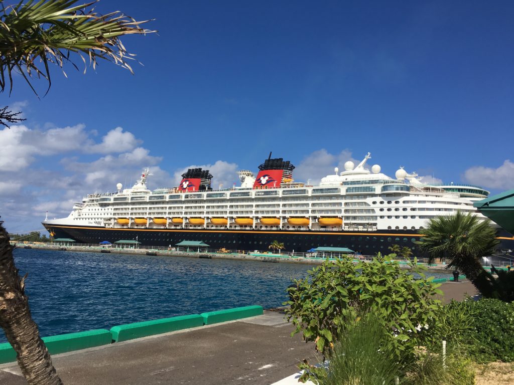 A photograph of a docked Disney Cruise ship. 