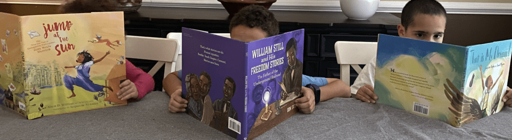 kids reading Black History Month books