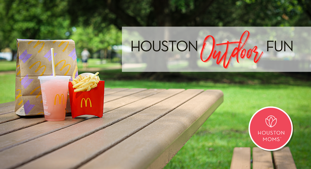 Houston Outdoors Fun. A photograph of a McDonald's bag, drink and fries on a picnic table. Logo: Houston moms.
