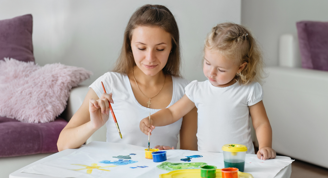 Awesome Mom painting with her toddler