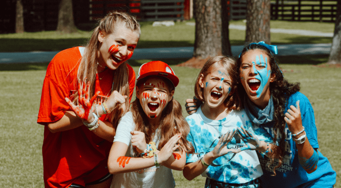 campers in painted faces