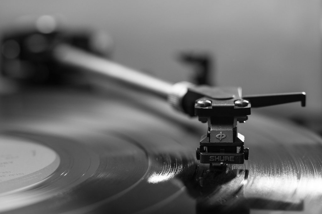 black and white close up of record player