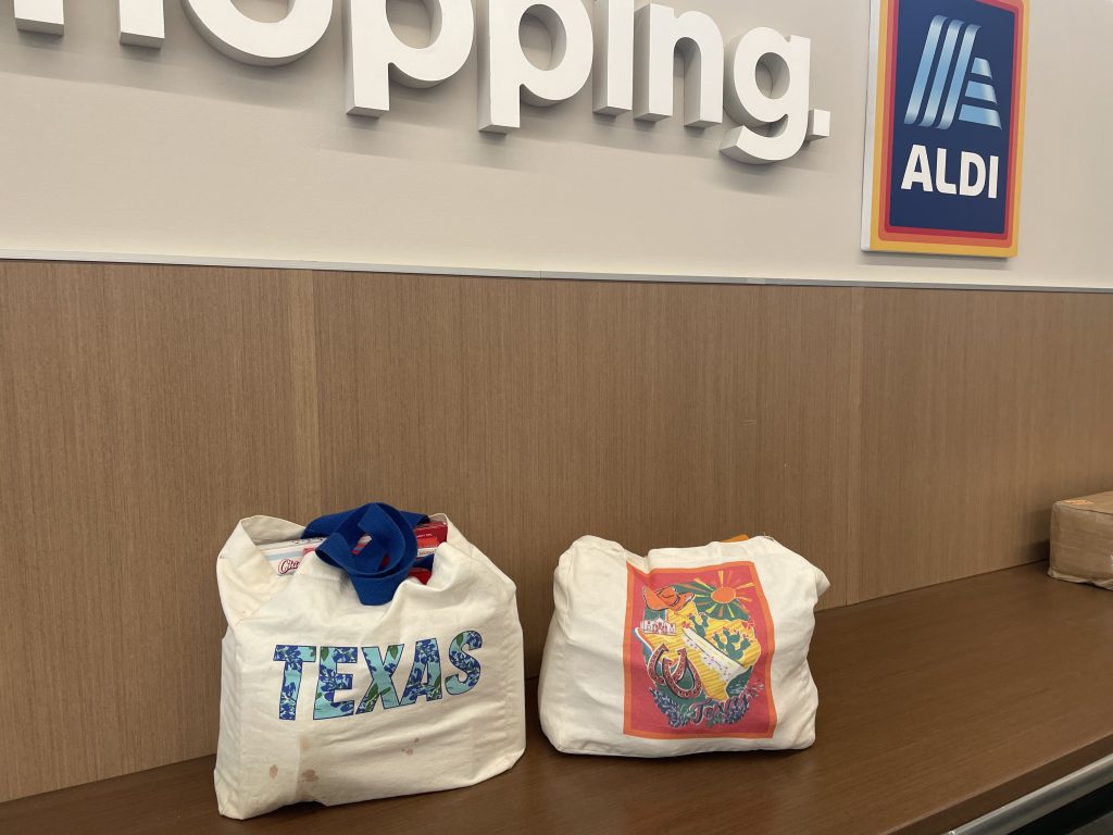 reusable shopping bags on ALDI counter