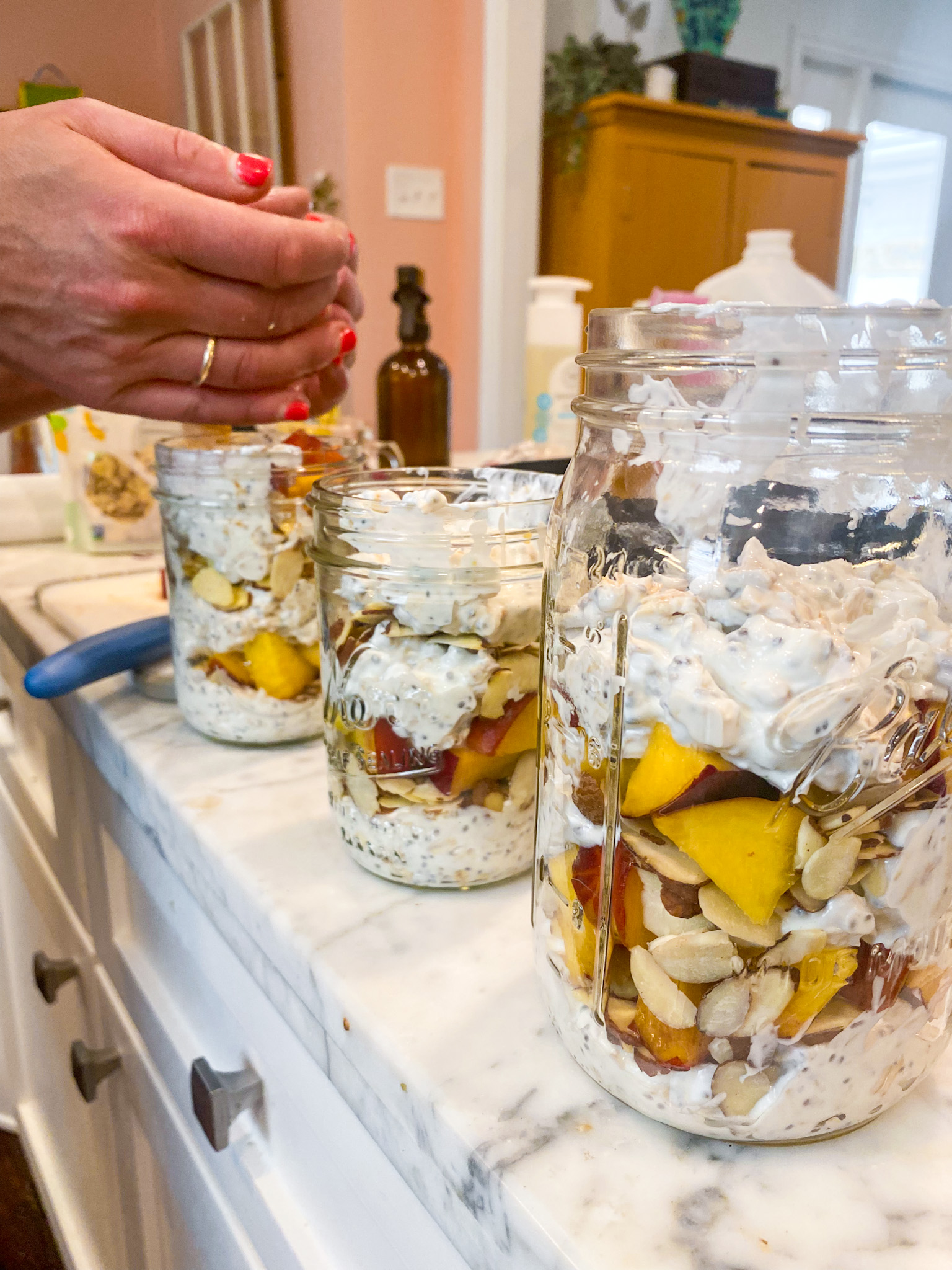 counter lined with mason jar breakfast meals