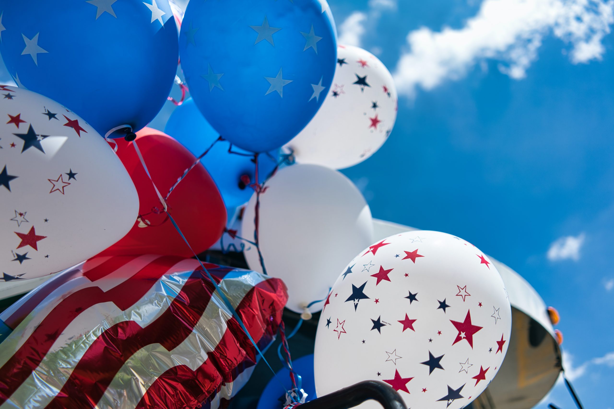 red white and blue baloons