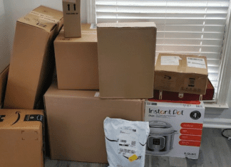 Amazon boxes stacked in corner