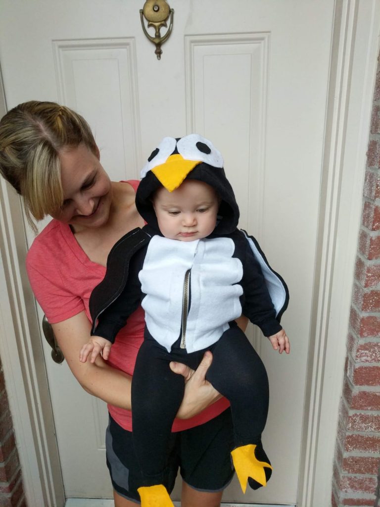 baby dressed as penguin