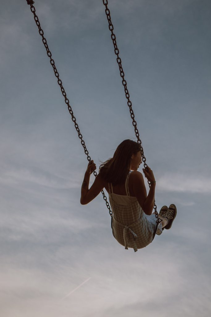 girl swinging
