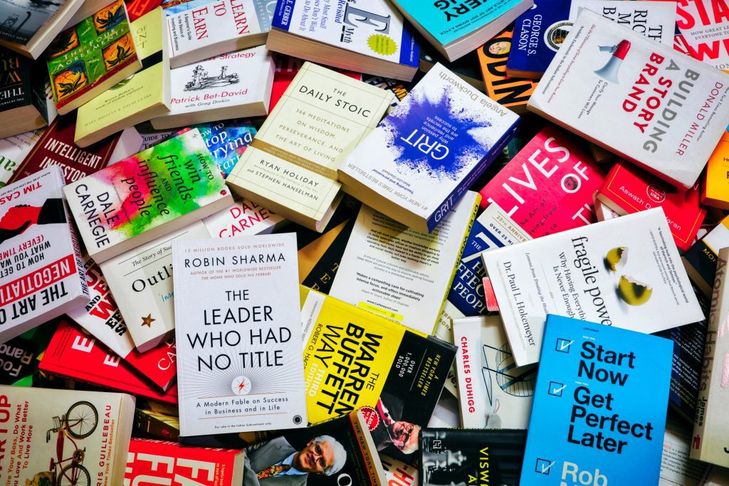 scattered pile of books