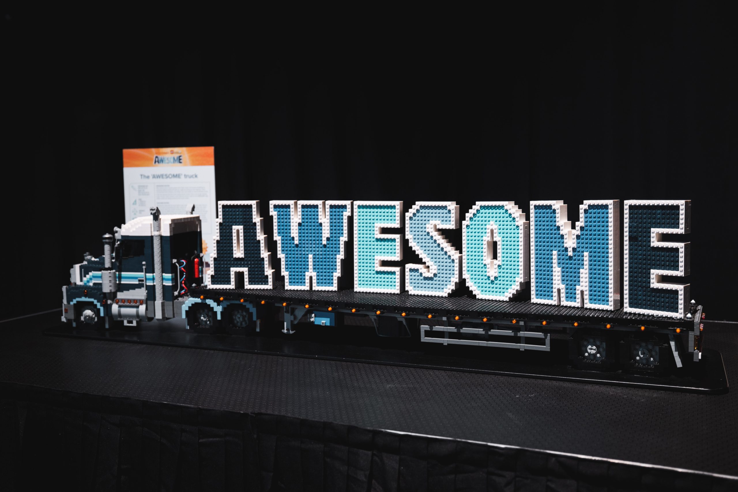 a big truck made of LEGO® bricks that spells out "AWESOME"