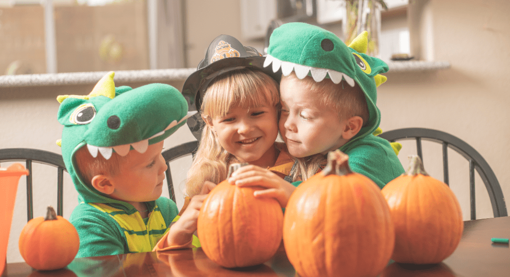 preschoolers in in dino costumes