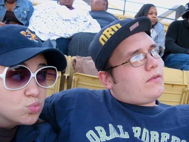 couple at a college baseball game