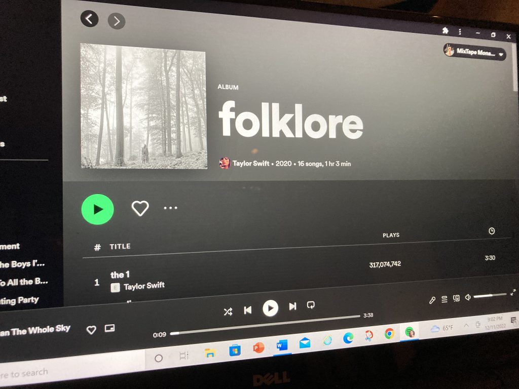 a computer screen showing the Spotify Folklore playlist from Taylor Swift