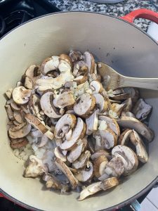 Add in your vegetables (2-3 cups). I'm using prewashed and pre-sliced baby bella mushrooms