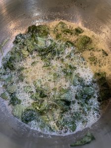 sage in pot with melted butter