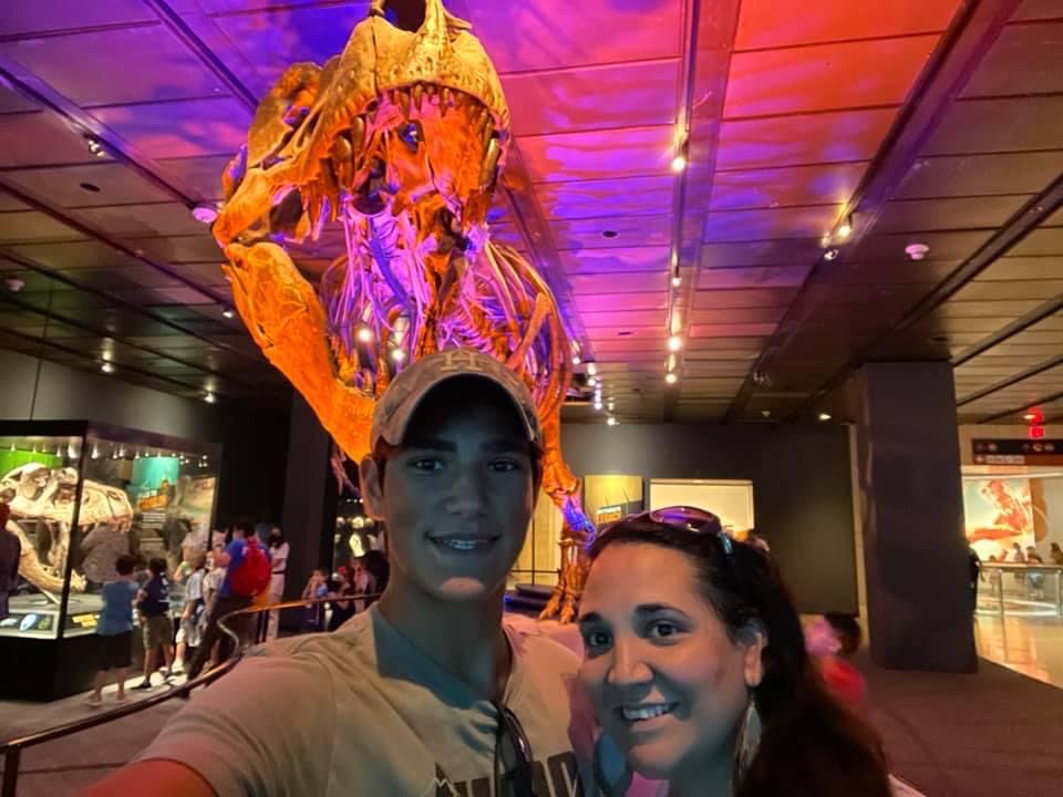 teenager and mom at a science museum